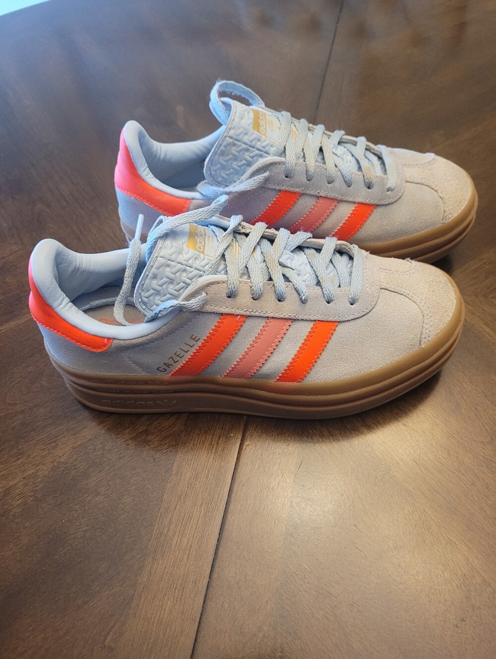 adidas Kids Gazelle Suede Sneakers in Light Blue with Orange Stripes.  Size 4.5